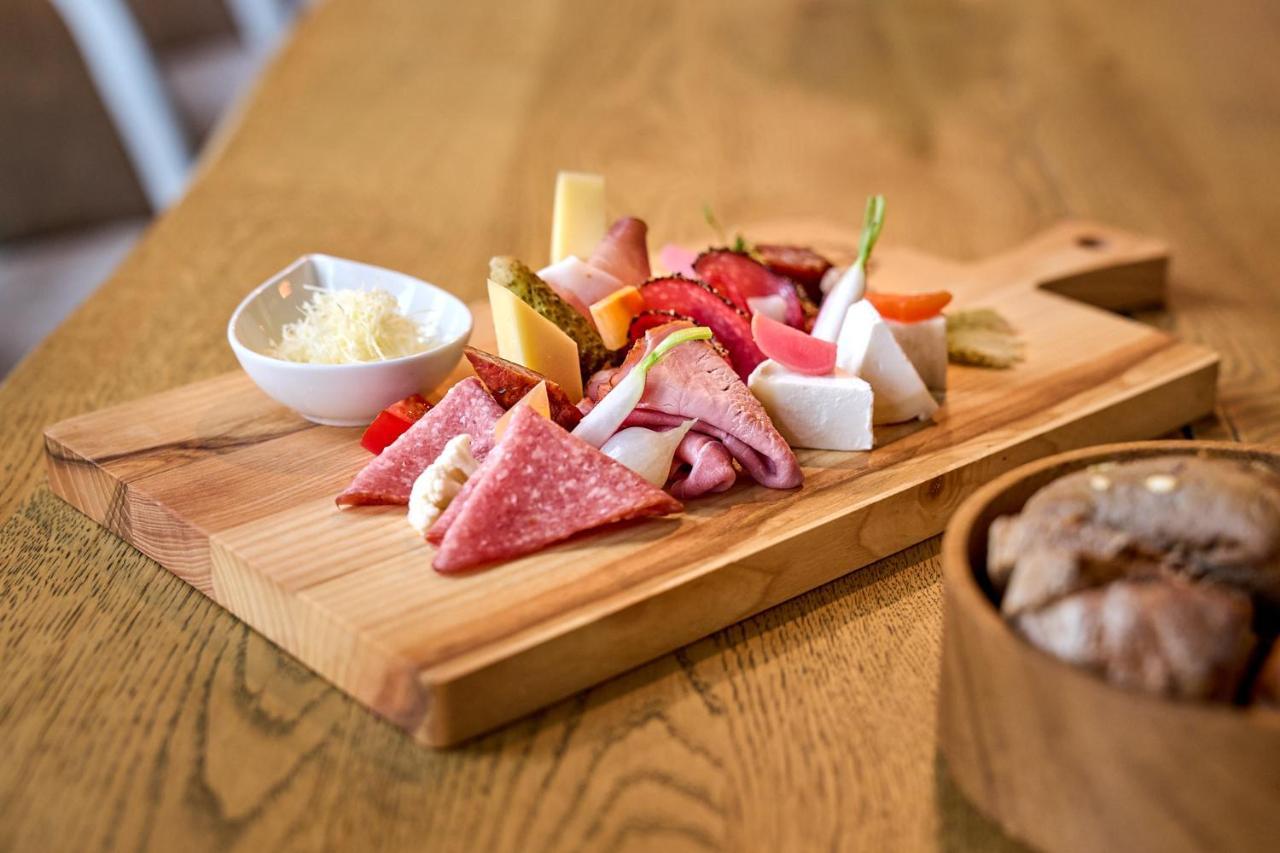 A-Rosa Ifen Hotel Kleinwalsertal Hirschegg  Exteriér fotografie A selection of cured meats and cheese